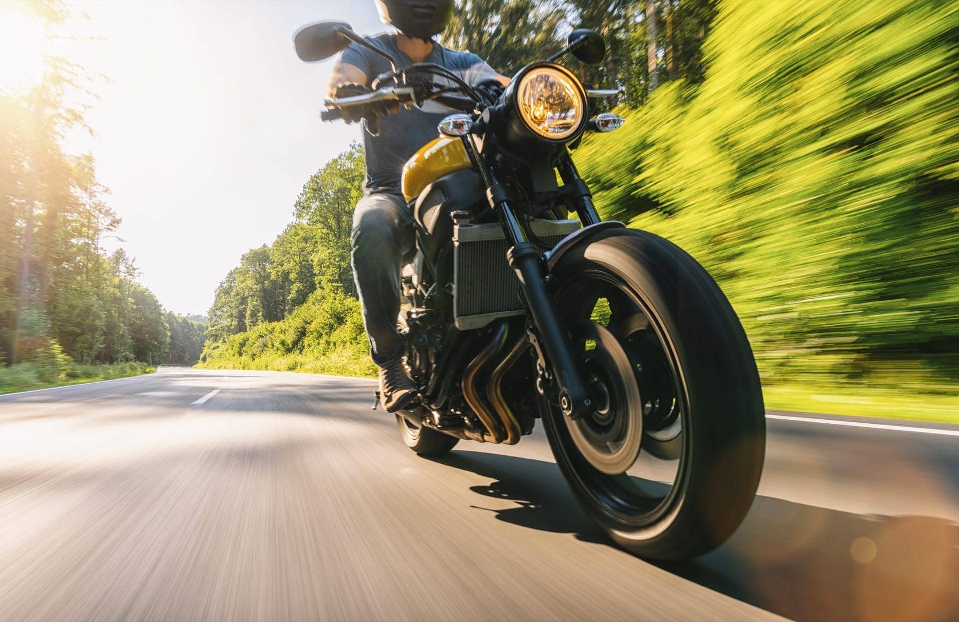 Responsible Motorcyclist Riding on a Back Road